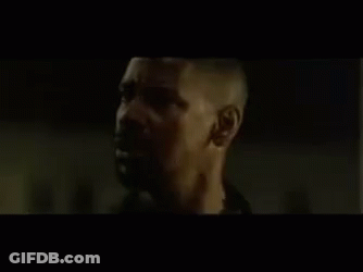 Man With Mouth Open In Dark Room GIF