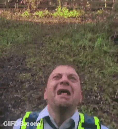 Man With Mouth Open In Yellow Vest GIF