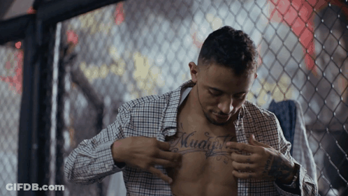 Man With Muaythai Chest Tattoo GIF