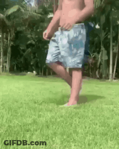Man With Mullet Holding Glasses GIF