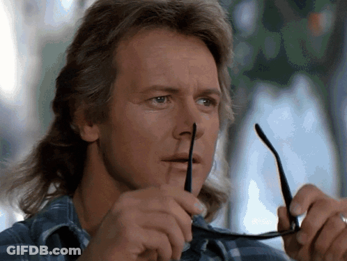 Man With Mullet Holding Glasses GIF