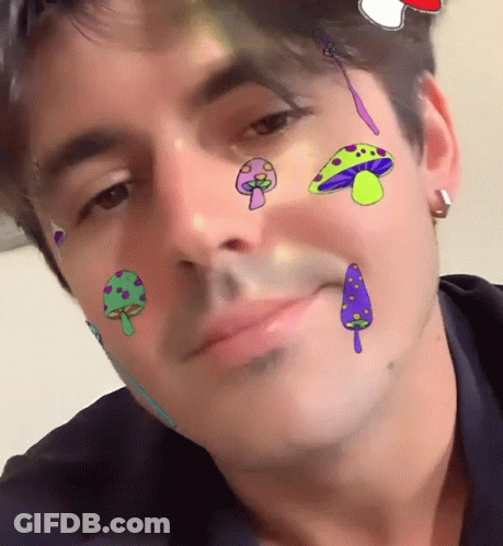 Man With Mushrooms Painted On Face GIF