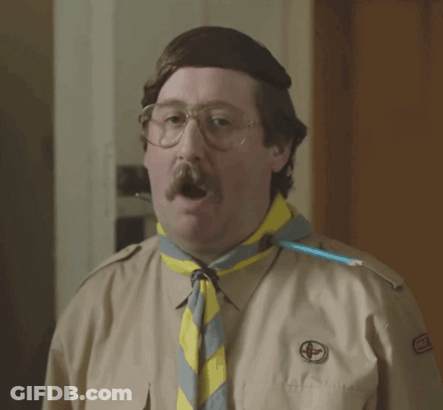 Man With Mustache And Glasses In Boy Scout Uniform GIF