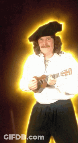 Man With Mustache And Hat Holding Guitar GIF