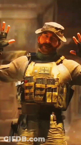 Man With Mustache And Hat In Dark Room GIF