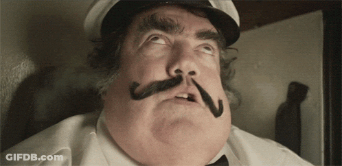 Man With Mustache And Hat Looking Up GIF