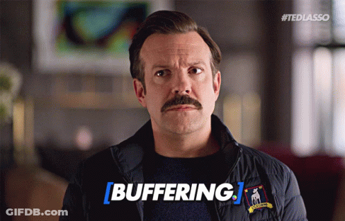 Man With Mustache And Jacket Saying Buffering GIF