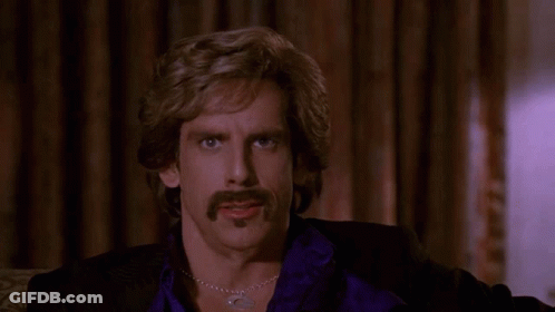 Man With Mustache And Necklace Thumbs Up GIF