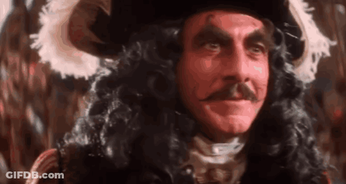 Man With Mustache And Pirate Hat And Wig GIF