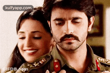 Man With Mustache And Smiling Woman GIF