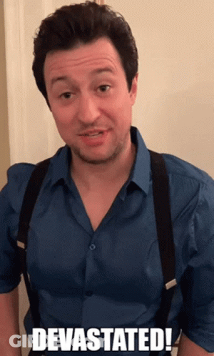 Man With Mustache And Suit Looking Down Eyes Closed GIF