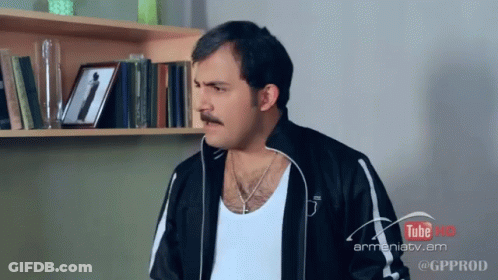 Man With Mustache And Tube Pro Sign GIF