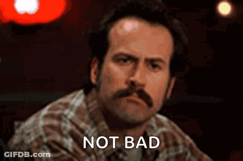 Man With Mustache At Bar Saying Not Bad GIF