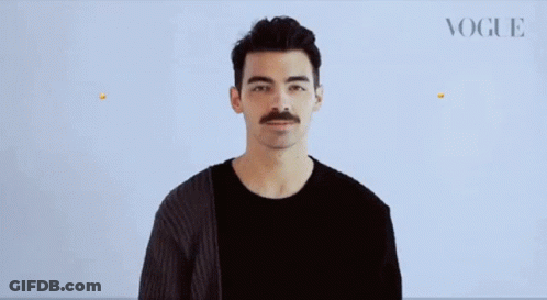 Man With Mustache Blowing Kiss With Two Emojis GIF