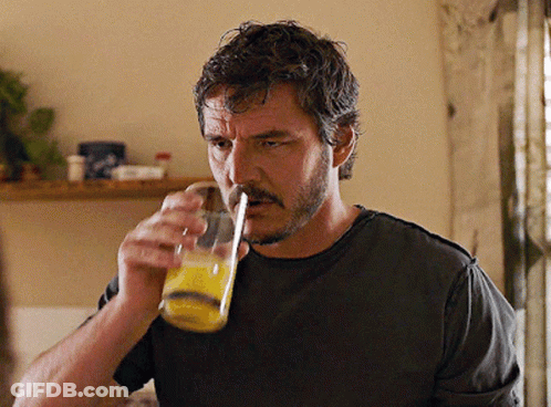 Man With Mustache Drinking Orange Juice Through Straw GIF