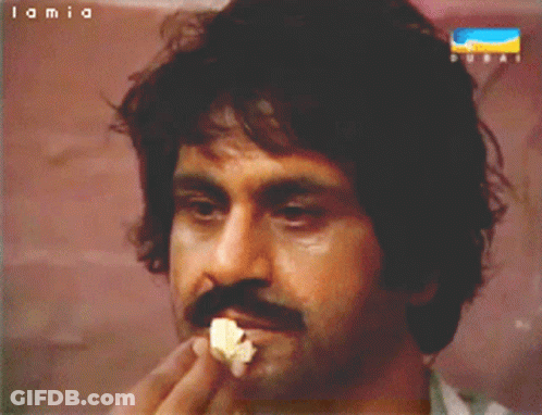 Man With Mustache Eating Popcorn Lamia Dubai GIF