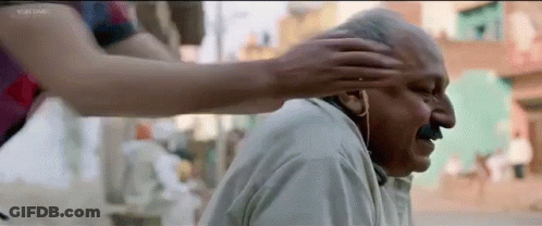 Man With Mustache Getting Head Rubbed By Woman GIF