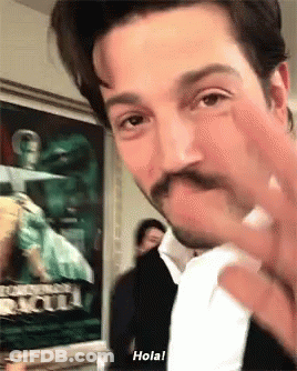 Man With Mustache Giving Middle Finger Says Hola GIF
