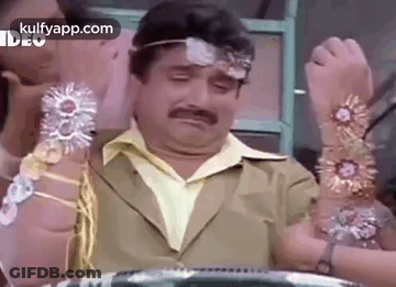 Man With Mustache Headband And Bracelets GIF