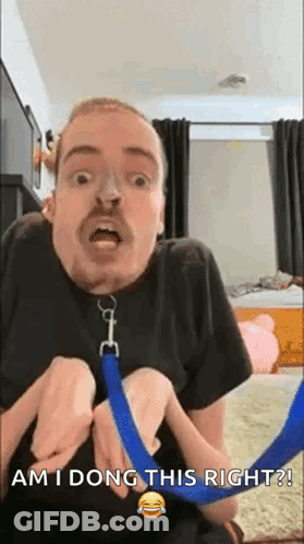 Man With Mustache Holding Blue Leash GIF