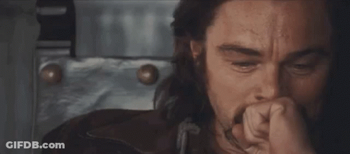 Man With Mustache Holding Gun Says John Fuckin Schneider GIF