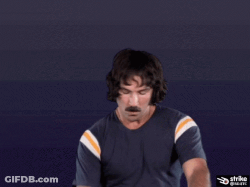 Man With Mustache Holding Sign Strike @ Rd.btc GIF