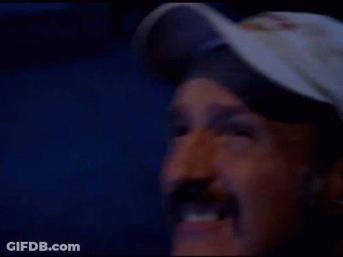 Man With Mustache In Baseball Cap Making Funny Face GIF