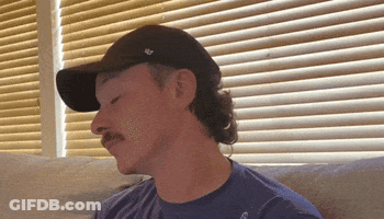 Man With Mustache In Black Hat And Blue Shirt GIF