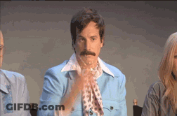 Man With Mustache In Blue Jacket And Scarf GIF