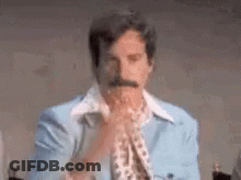 Man With Mustache In Blue Jacket And White Shirt GIF