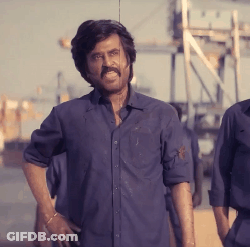 Man With Mustache In Blue Shirt Hands On Hips GIF