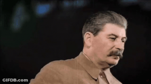 Man With Mustache In Brown Jacket And Tie GIF