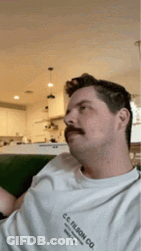 Man With Mustache In C.C. Filson Co. Shirt GIF