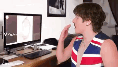 Man With Mustache In Front Of Computer GIF