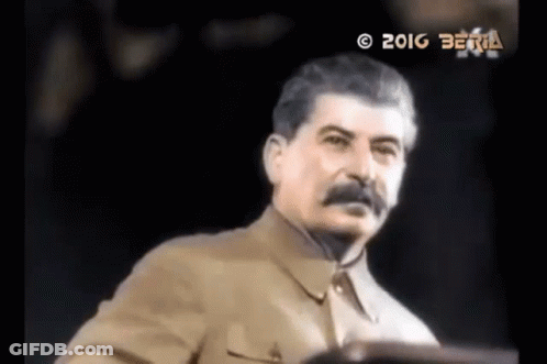 Man With Mustache In Front Of Crowd GIF