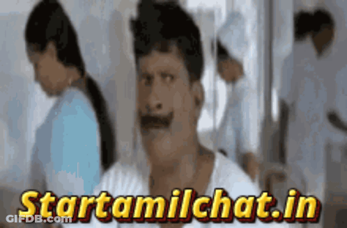 Man With Mustache In Front Of Startamilchat.in Sign GIF