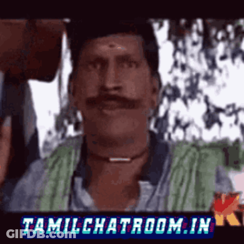 Man With Mustache In Front Of Tamil Chatroom Sign GIF