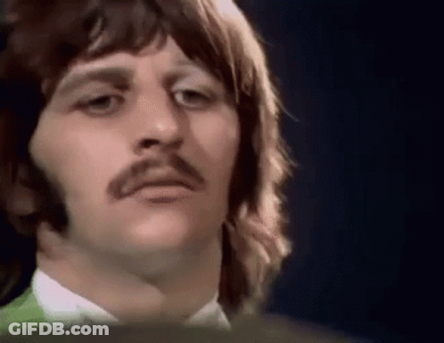 Man With Mustache In Green And White Shirt GIF