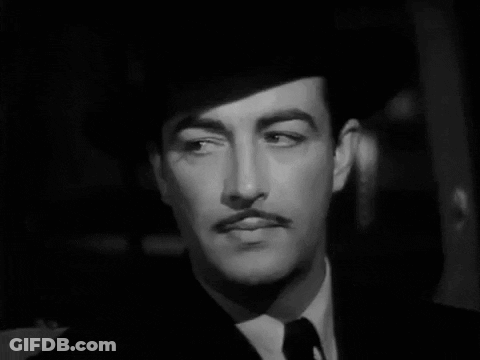 Man With Mustache In Hat And Tie GIF