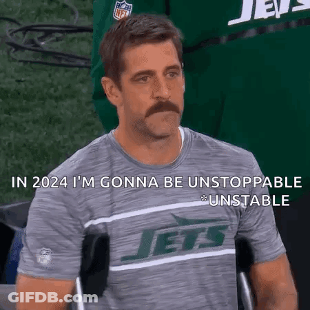 Man With Mustache In Jets Shirt In Wheelchair GIF