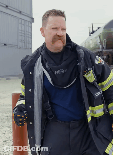 Man With Mustache In Prevent Jacket GIF
