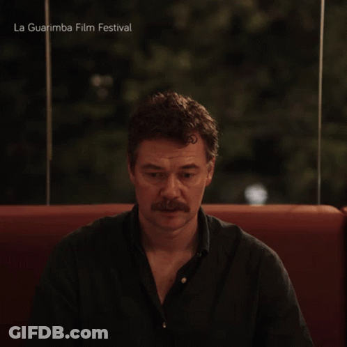 Man With Mustache In Red Chair La Guarimba Film Festival GIF