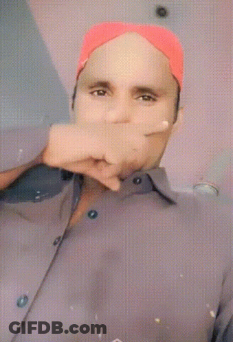 Man With Mustache In Red Hat Thumbs Down GIF