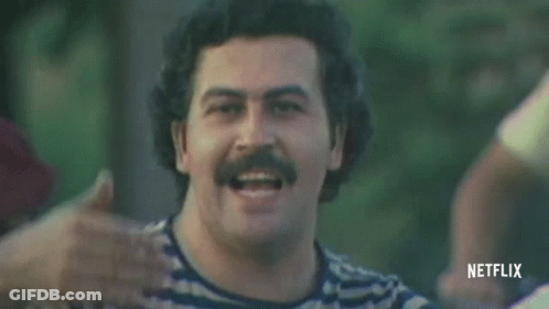 Man With Mustache In Striped Shirt And Red Hat Smiling GIF