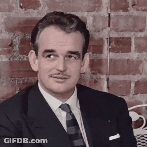 Man With Mustache In Suit And Tie GIF