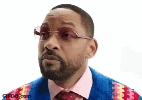Man With Mustache In Suit And Tie Looking GIF