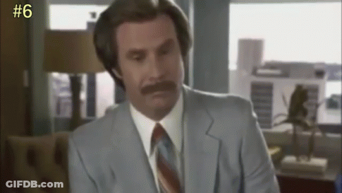 Man With Mustache In Suit And Tie Number 6 GIF