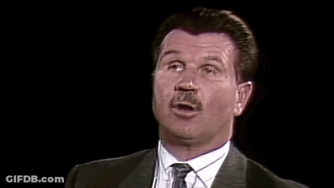 Man With Mustache In Suit Making Funny Face GIF