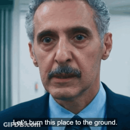 Man With Mustache In Suit Says Let's Burn This Place GIF