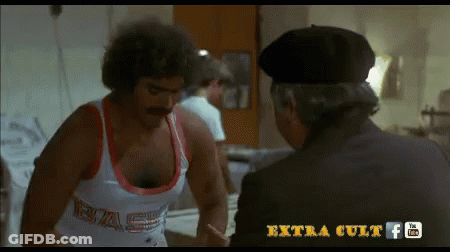 Man With Mustache In Tank Top Saying Bas GIF